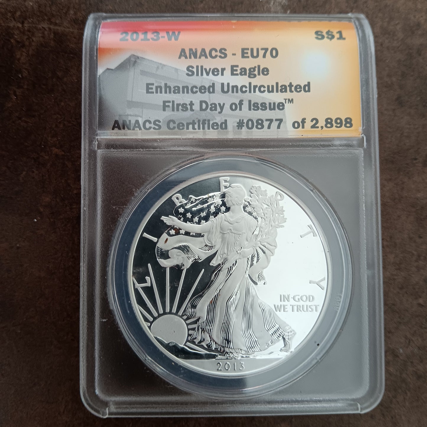2013 W Enhanced Uncirculated American Silver Eagle - 1st Day Issue is ANACS Graded a Perfect EU70
